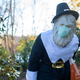 A Sasquatch statue dressed as a pilgrim with a face mask is spotted in Bucks County, Pennsylvania.